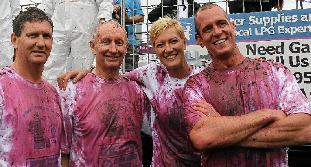 THE CRUSHERS: (From left) Lawrence Springborg, Bruce Scott, Fiona Hannan, and ’Fast’ Ed Halmagyi emerge unscathed from the celebrity grape crush.